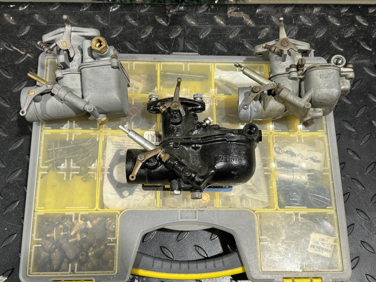 Three carburetors overhauled