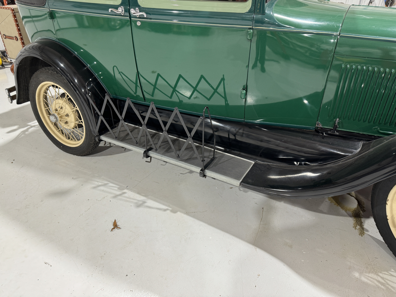 Passenger side with removable, expanding storage gate expanded