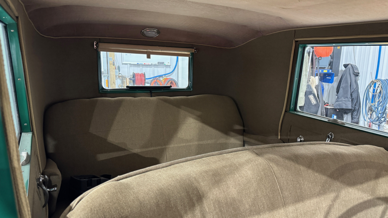 Rear view showing window shade (functional)