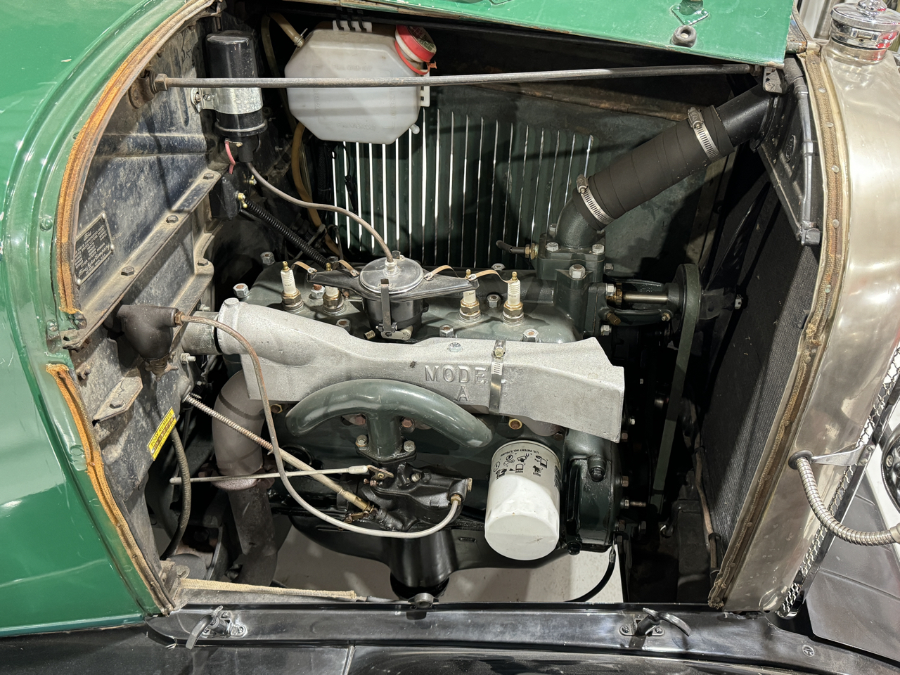Passenger side of engine. Oil filter and cabin heater.